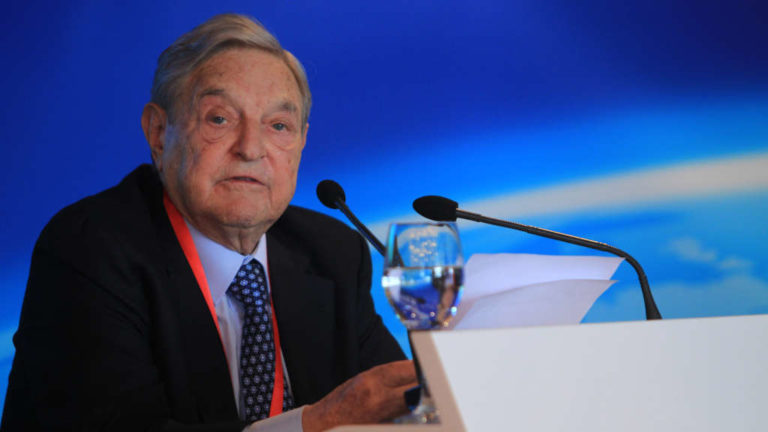 Soros György.