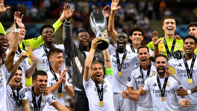 WARSAW, POLAND - AUGUST 14: Luka Modric of Real Madrid lifts the UEFA Super Cup Trophy after his team's victory in the UEFA Super Cup 2024 match between Real Madrid and Atalanta BC at National Stadium on August 14, 2024 in Warsaw, Poland.